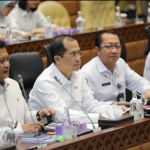 Status hukum lahan transmigrasi yang tumpang tindih kawasan hutan