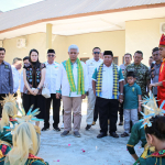 Acara pelantikan pengurus APRI Konawe, dengan penari tradisional dan tokoh masyarakat serta pejabat setempat.