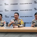 Kabid Humas Polda Metro Jaya Budi Hermanto saat memberi keterangan terkait hoaks MBG Uya Kuya di Jakarta