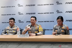 Kabid Humas Polda Metro Jaya Budi Hermanto saat memberi keterangan terkait hoaks MBG Uya Kuya di Jakarta