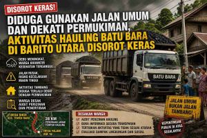 aktivitas hauling batu bara Sikui di jalan umum dekat permukiman warga